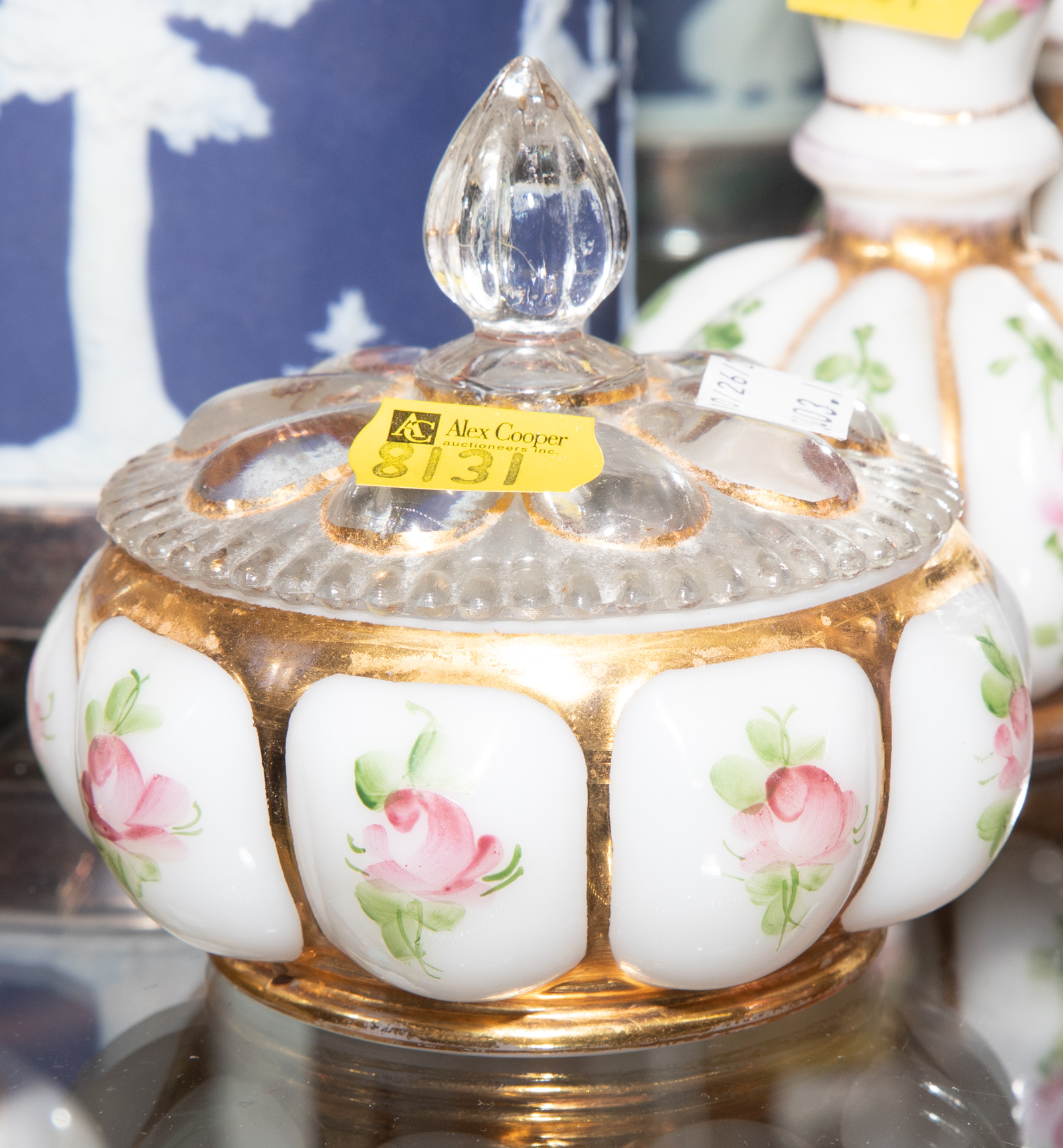 Appraisal: FOUR PAINTED GLASS DRESSER JARS A WEDGWOOD TOBACCO JAR