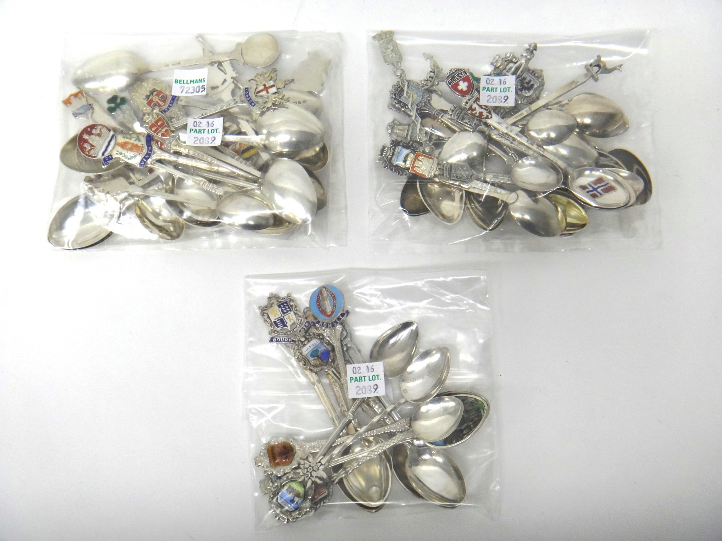 Appraisal: A collection of fifty-five souvenir and town crest spoons comprising