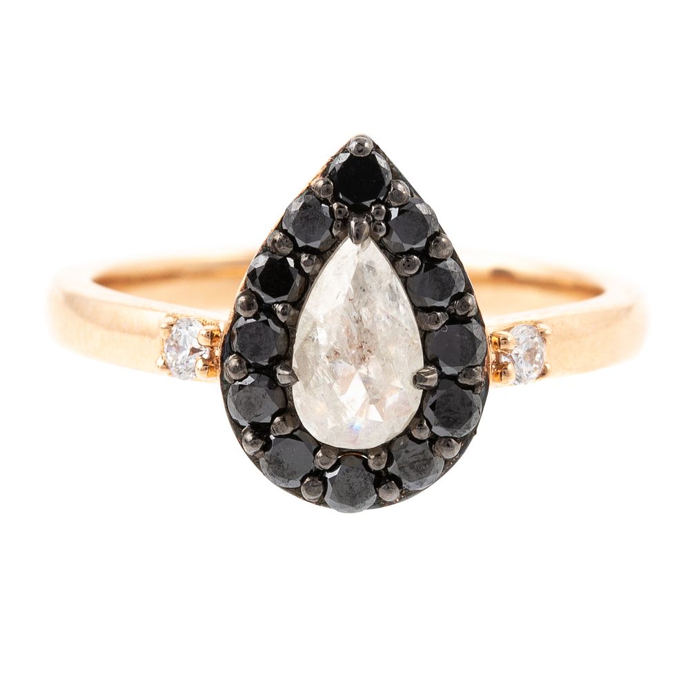 Appraisal: A Pear Shape Diamond Black Diamond Ring in K K