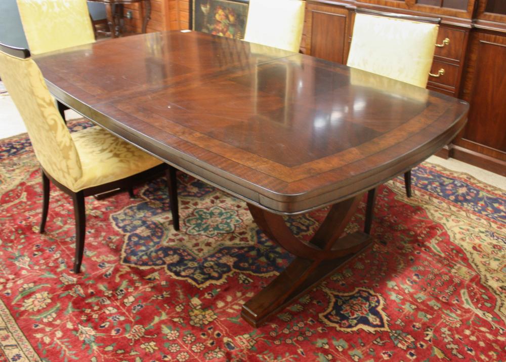 Appraisal: MODERN WALNUT AND MAHOGANY EXTENSION DINING TABLE with two leaves