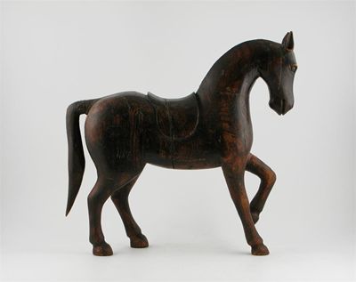 Appraisal: A carved wood model of a horse made in sections