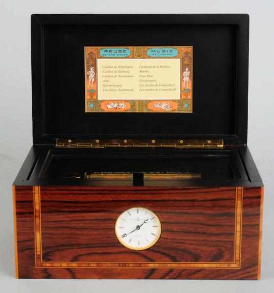 Appraisal: Reuge Quartz Movement Clock with Music Box Plays one of