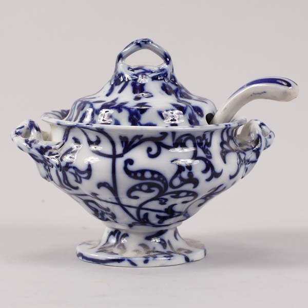 Appraisal: Delft style blue and white gravy with lid and ladle