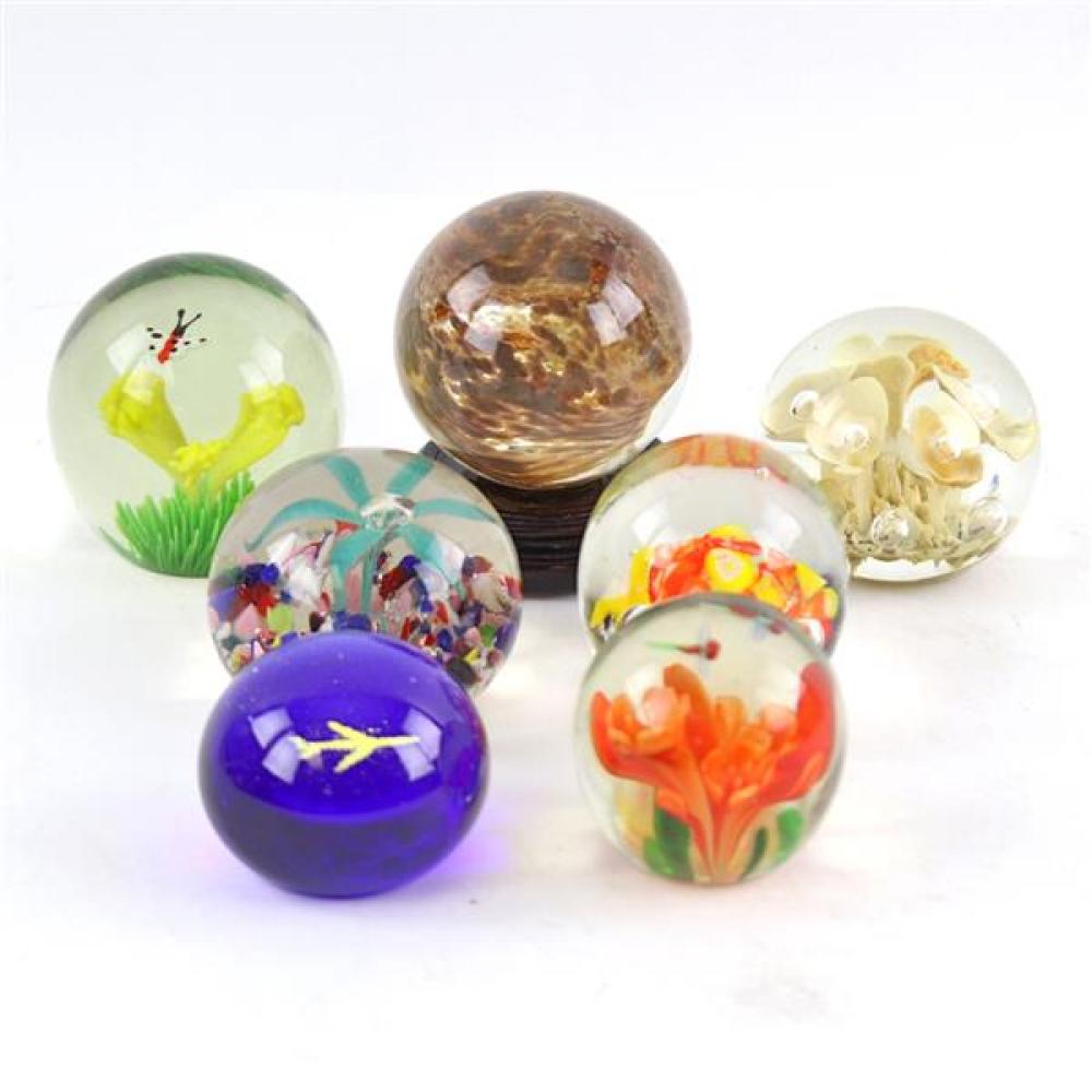 Appraisal: GROUP OF PAPER WEIGHTS INCLUDES INSIDE DESIGNS OF FLOWERS WITH