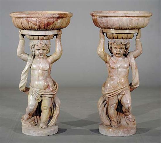 Appraisal: Continental school th century PAIR JARDINIERES SUPPORTED ON PUTTIrose marble