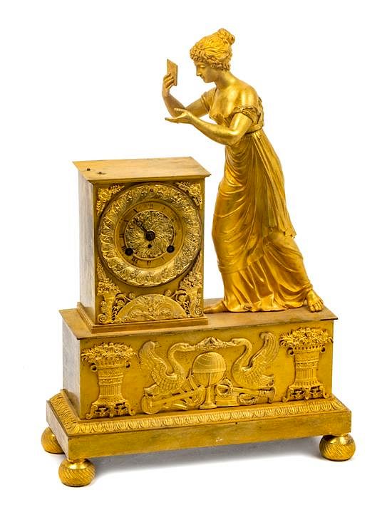 Appraisal: A French Empire Style Gilt Bronze Mantel Clock Height inches