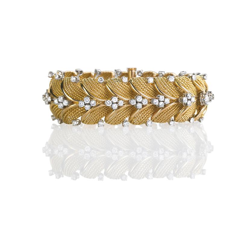 Appraisal: DIAMOND K YELLOW GOLD BRACELET Concentric corded gold wire links