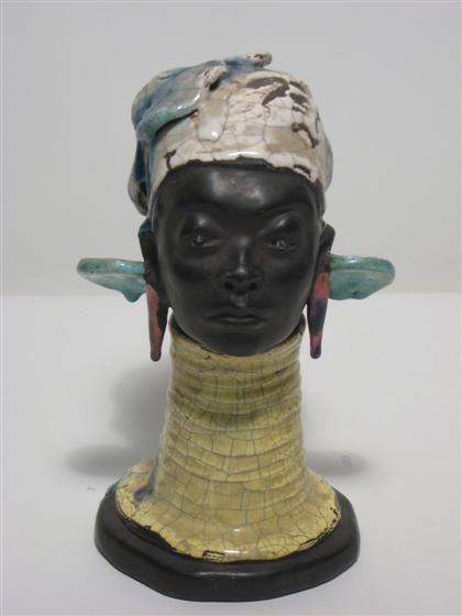 Appraisal: Pottery bust of African woman th century Depicting the neck