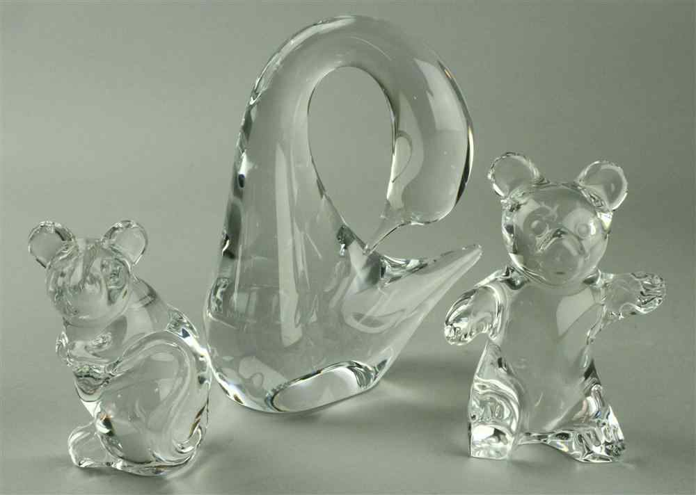 Appraisal: THREE DAUM GLASS ORNAMENTS including a preening swan a teddy