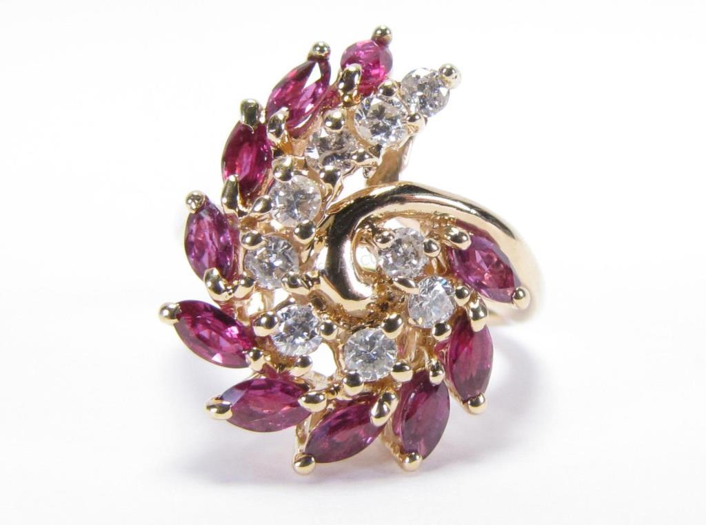 Appraisal: A K yellow gold fashion ring containing ten marquis rubies