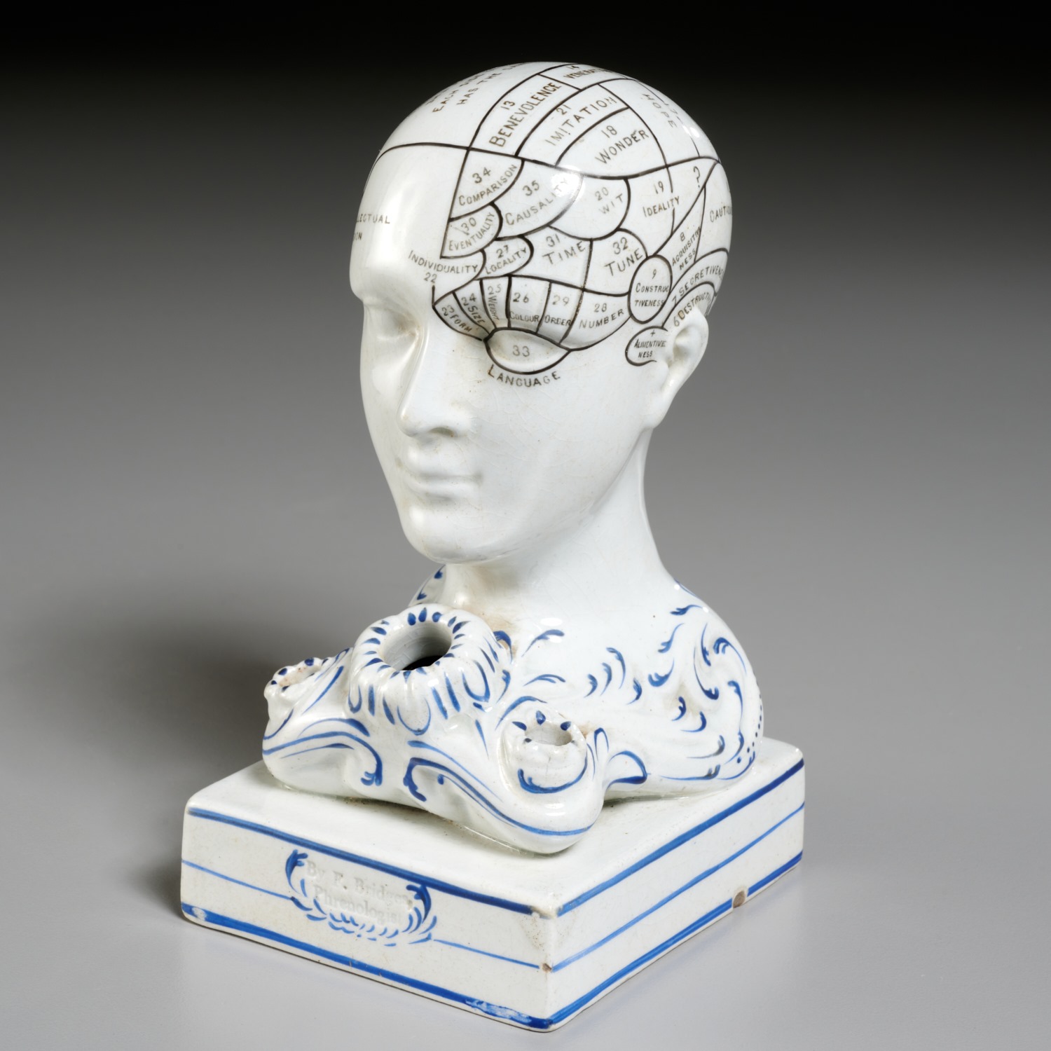 Appraisal: BENNINGTON POTTERY PHRENOLOGICAL HEAD INKWELL th c American blue and