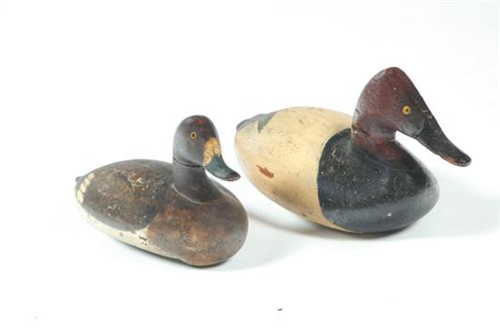 Appraisal: TWO DECOYS American early th century hardwood Working decoys with