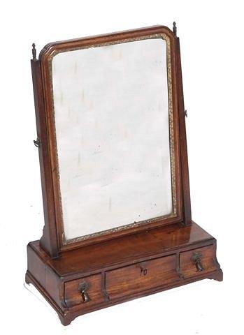 Appraisal: AN TH CENTURY WALNUT SWING TOILET MIRROR with old plate