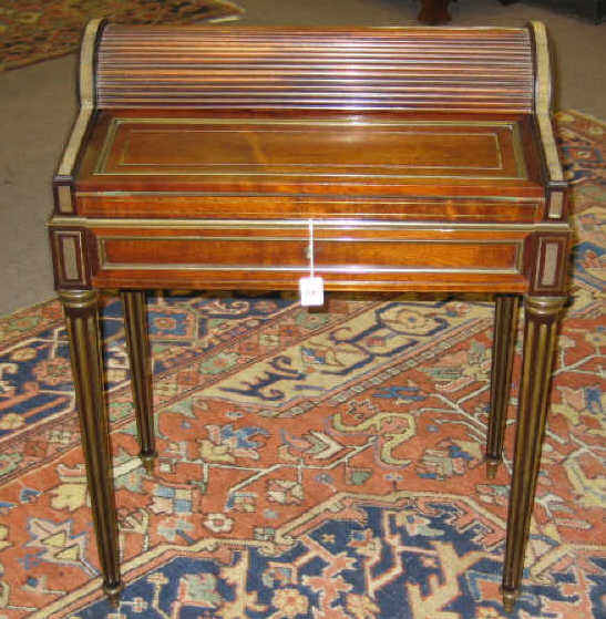 Appraisal: CONTINENTAL MAHOGANY AND BRASS WRITING DESK Having an interactive tambour