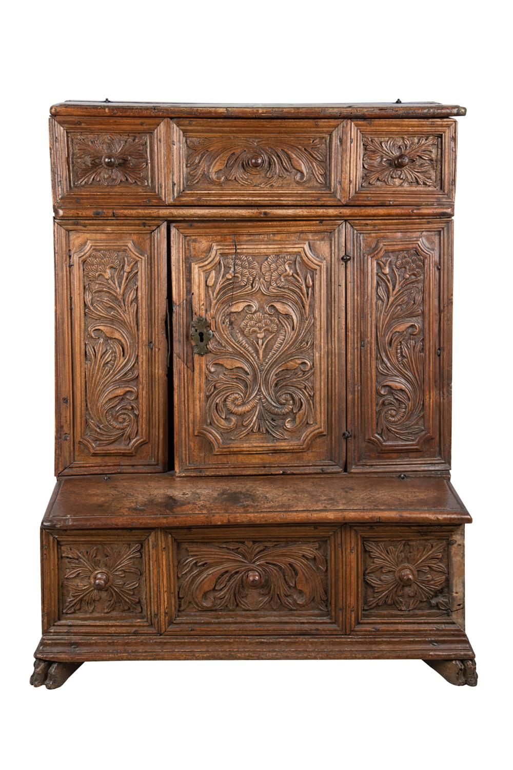 Appraisal: ITALIAN CARVED WALNUT PRIE-DIEUhaving three false drawer fronts over a