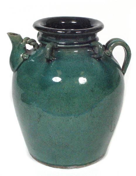 Appraisal: A pair of Chinese glazed green jars height in diameter