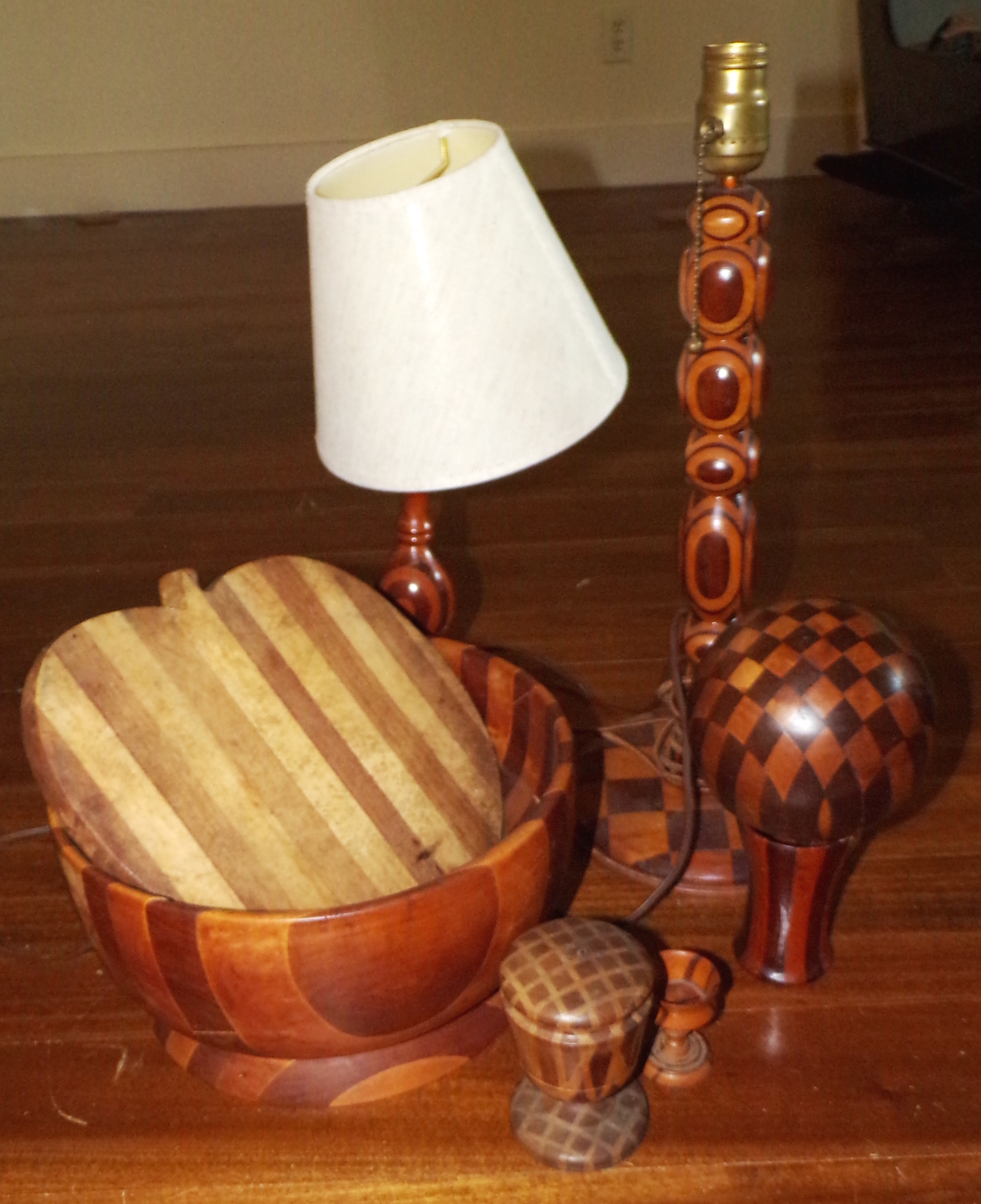 Appraisal: Woodware including lamps bowl carpet ball etc