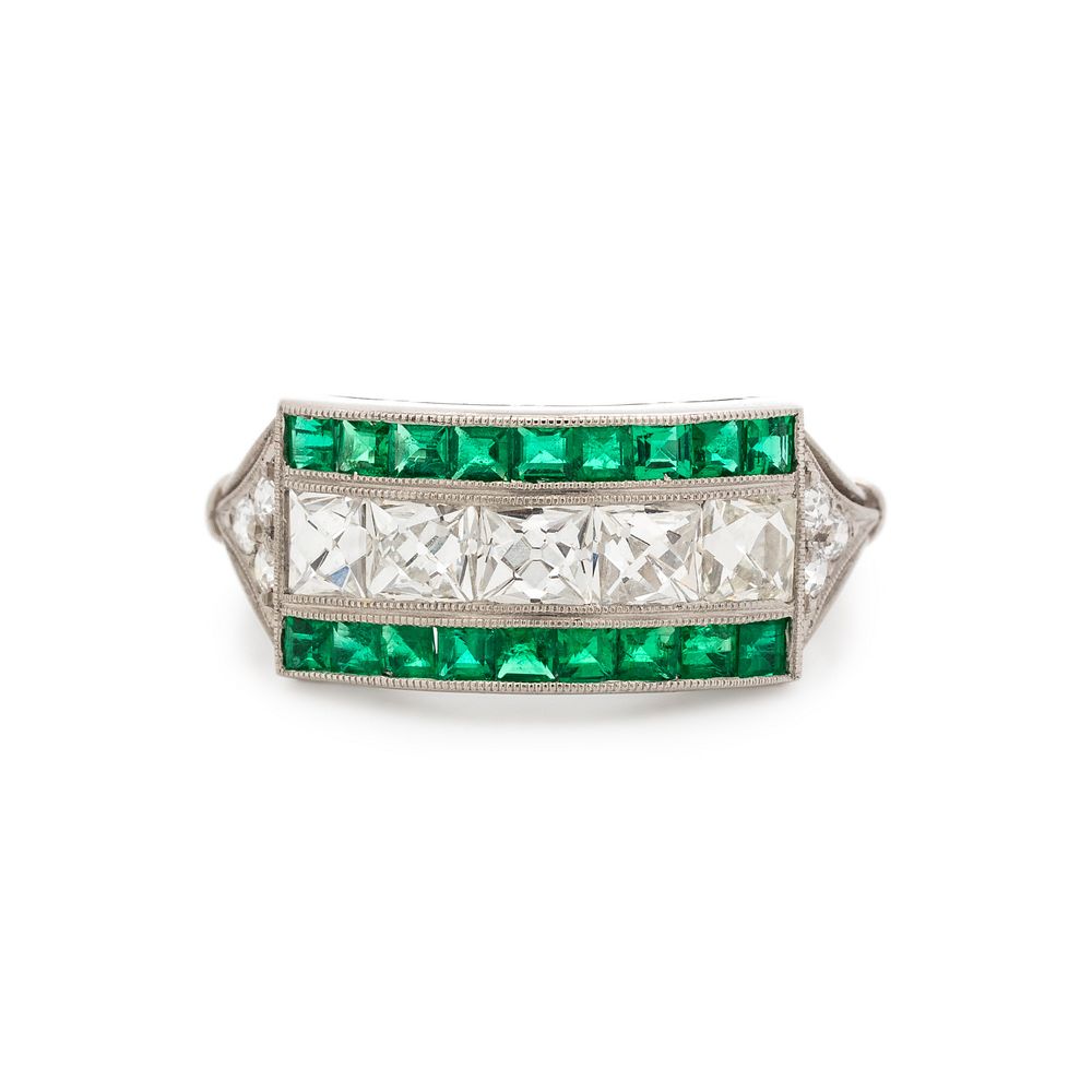 Appraisal: DIAMOND AND EMERALD RING DIAMOND AND EMERALD RING Containing five