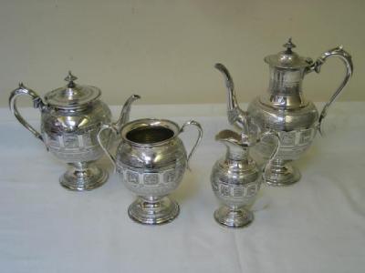 Appraisal: A VICTORIAN FOUR PIECE TEA AND COFFEE SET of baluster