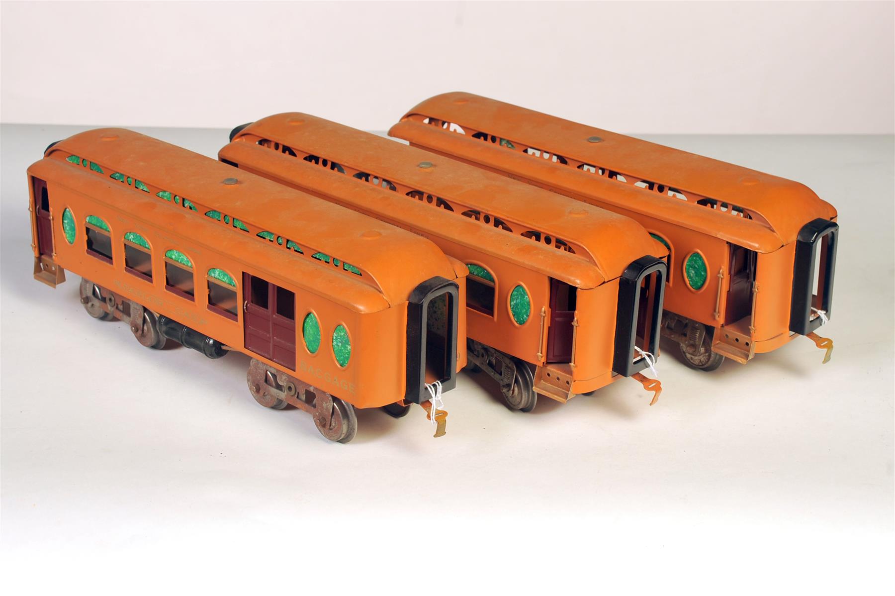 Appraisal: THREE EARLY LIONEL STANDARD GAUGE PASSENGER CARS INCLUDING COMBINE BAGGAGE