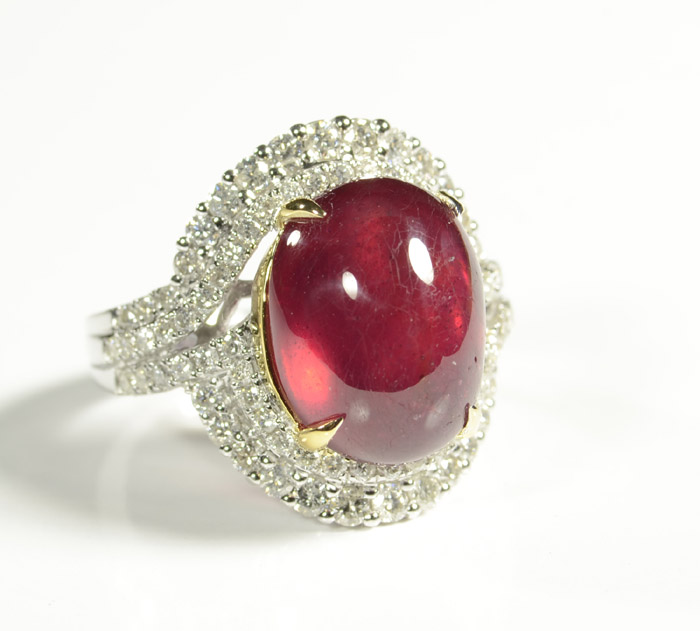 Appraisal: RUBY DIAMOND AND FOURTEEN KARAT WHITE GOLD DINNER RING featuring