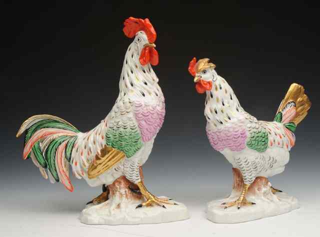 Appraisal: A PAIR OF PARIS PORCELAIN CHICKENS in bright enamel colours