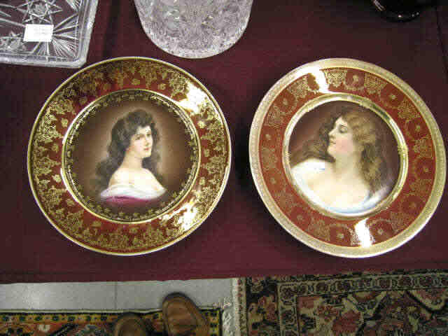 Appraisal: Pair of Royal Vienna Portrait Plates maidens burgundy gold trim