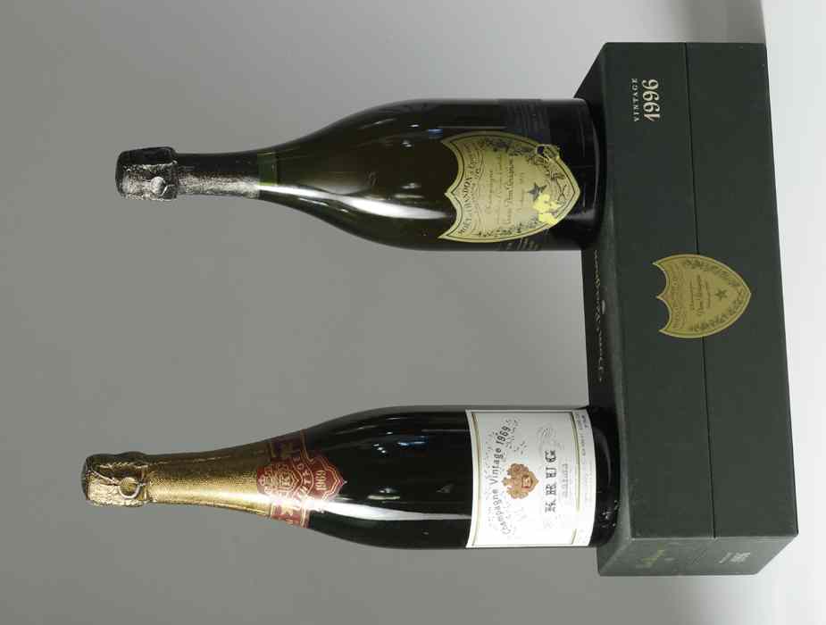 Appraisal: THREE BOTTLES OF VINTAGE FRENCH CHAMPAGNE and Dom Perignon the