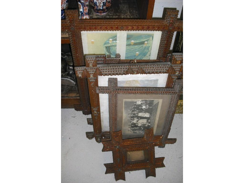 Appraisal: Selection of eight Tramp Art frames of varying forms and