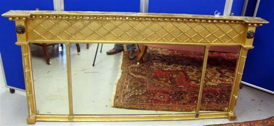 Appraisal: Regency gilt framed overmantel mirror with applied lions head mounts