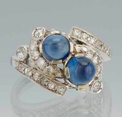 Appraisal: A Sapphire and Diamond Bypass Ring k white gold ring