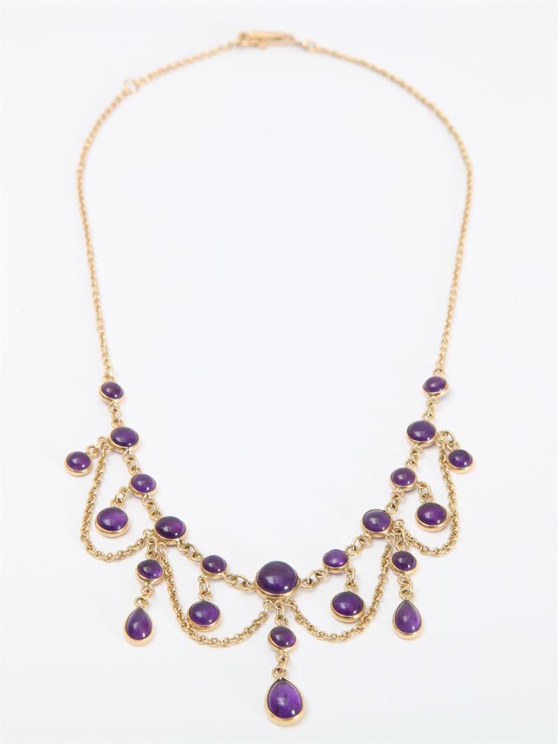 Appraisal: K GOLD AND AMETHYST NECKLACE Swag chain with round and