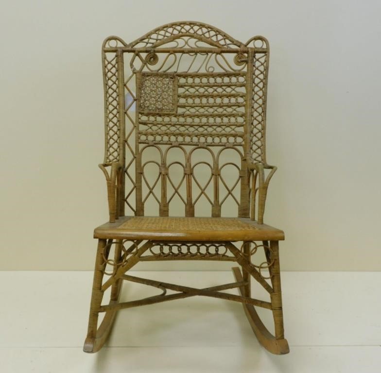 Appraisal: centennial wicker rocking chair The chair features the date and