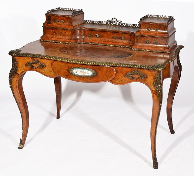 Appraisal: A VICTORIAN KINGWOOD WRITING DESK with inset oval French porcelain