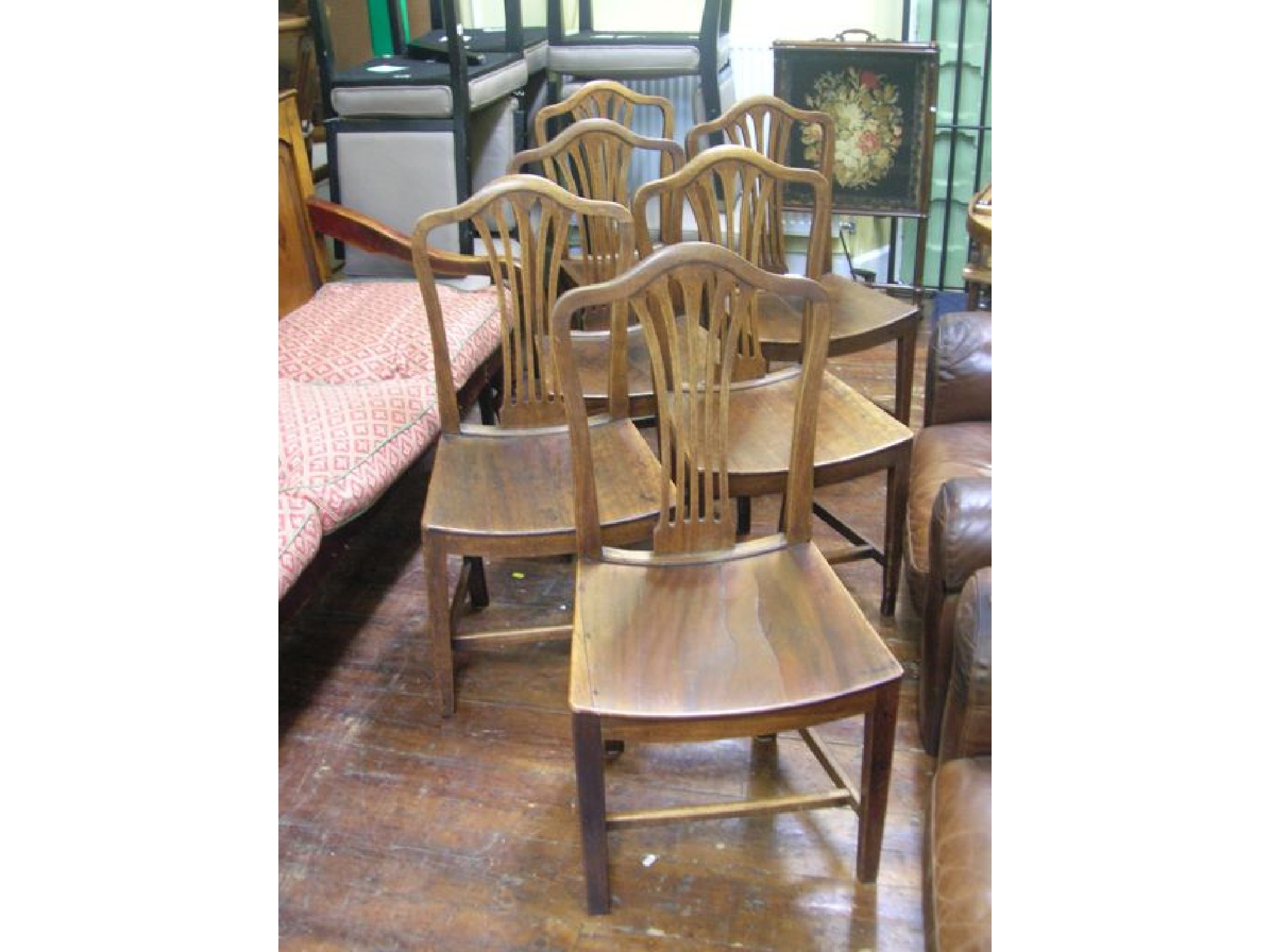 Appraisal: A set of six Georgian mahogany dining chairs with pierced