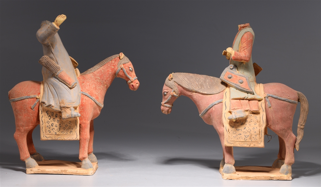 Appraisal: Two Chinese ceramic statues of horses and riders the riders