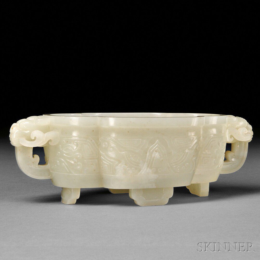 Appraisal: Jade Bowl China four-lobed oval bowl with two animal mask