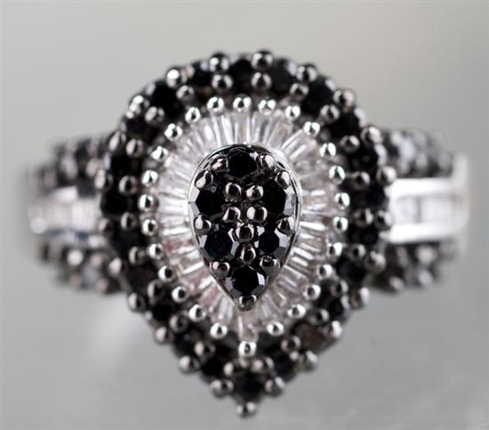 Appraisal: KT white gold and black and white diamond ring In