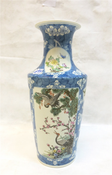 Appraisal: CHINESE PORCELAIN VASE Famille Rose enamel reserves surrounded in blue