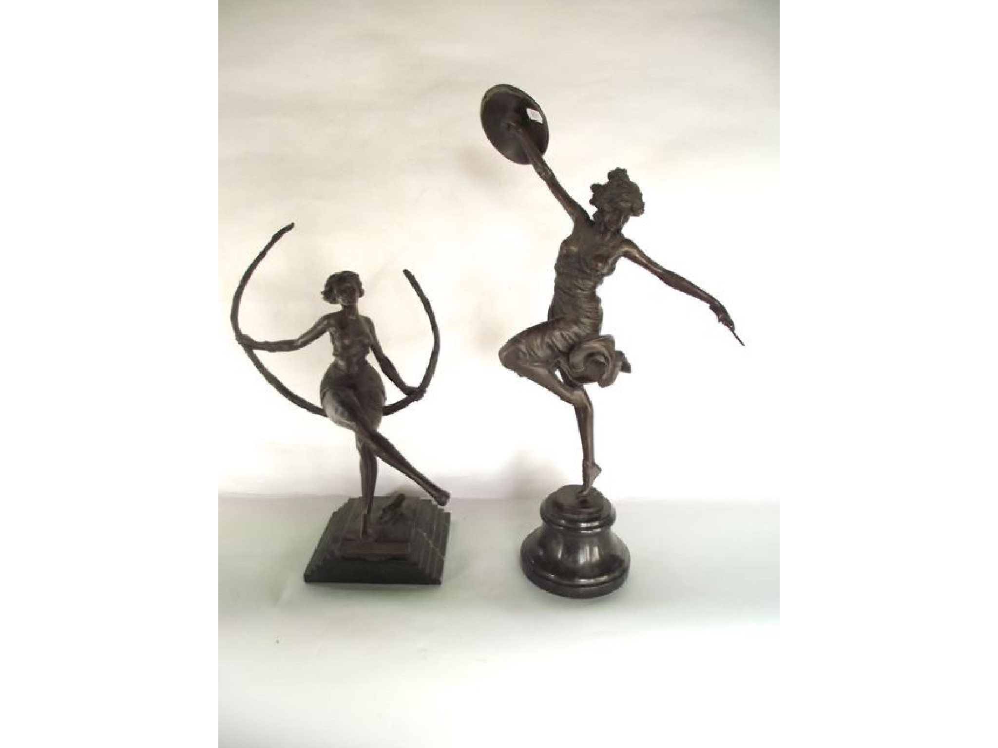 Appraisal: A cast bronze study of a female balancing on one