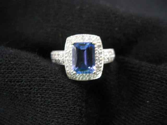 Appraisal: Tanzanite Diamond Ring rich rectangular carat gem surrounded by diamonds