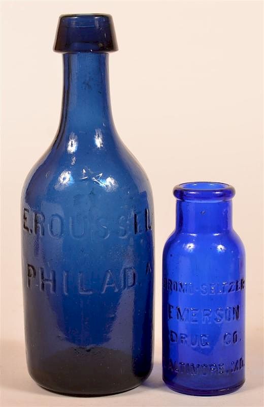 Appraisal: Two Blue Glass Bottles Two Blue Glass Bottles st E