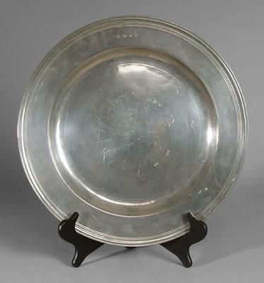 Appraisal: English pewter charger four cartouche marks on rim for John