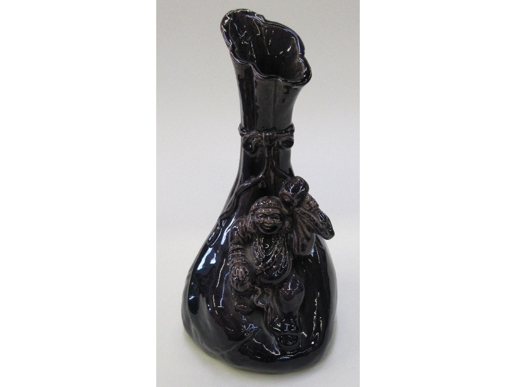 Appraisal: Purple glazed Japanese vase with relief figure decoration and an