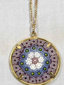 Appraisal: A glass and metal mounted pendant circa