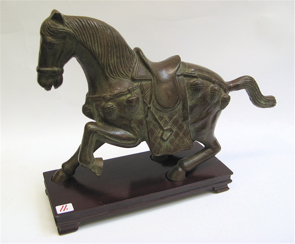 Appraisal: BRONZE CHINESE TANG STYLE HORSE in full tack with one