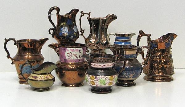 Appraisal: An assembled group of ten copper luster pitchers second half