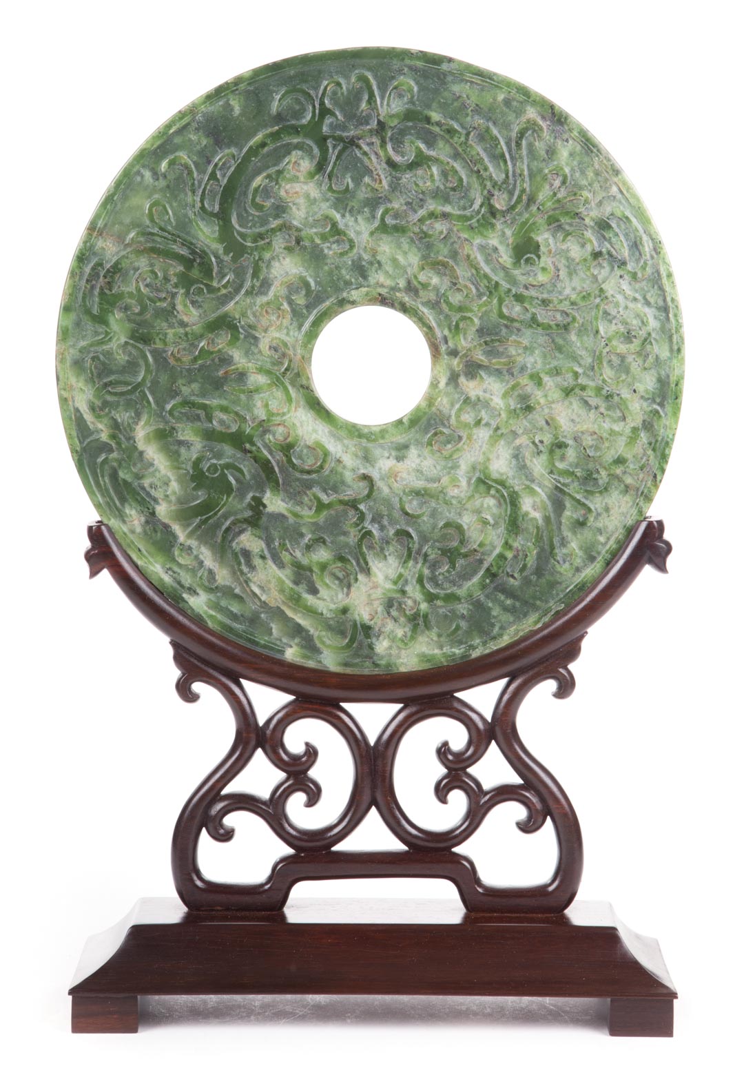 Appraisal: Chinese carved jade pi jade disk having carved dragon relief