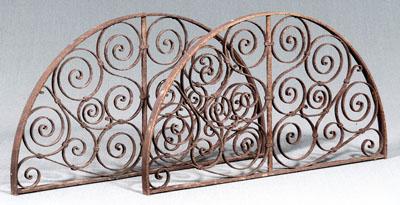 Appraisal: Pair iron architectural grates each arched with open scrolled decorative