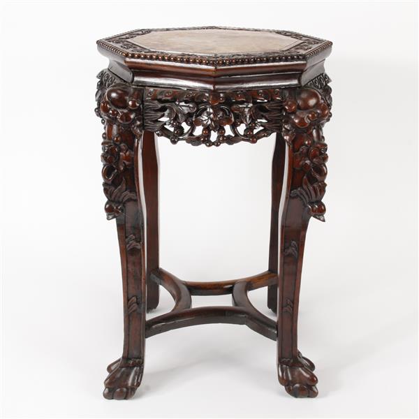 Appraisal: Chinese profusely carved hex top stand with inset marble paw